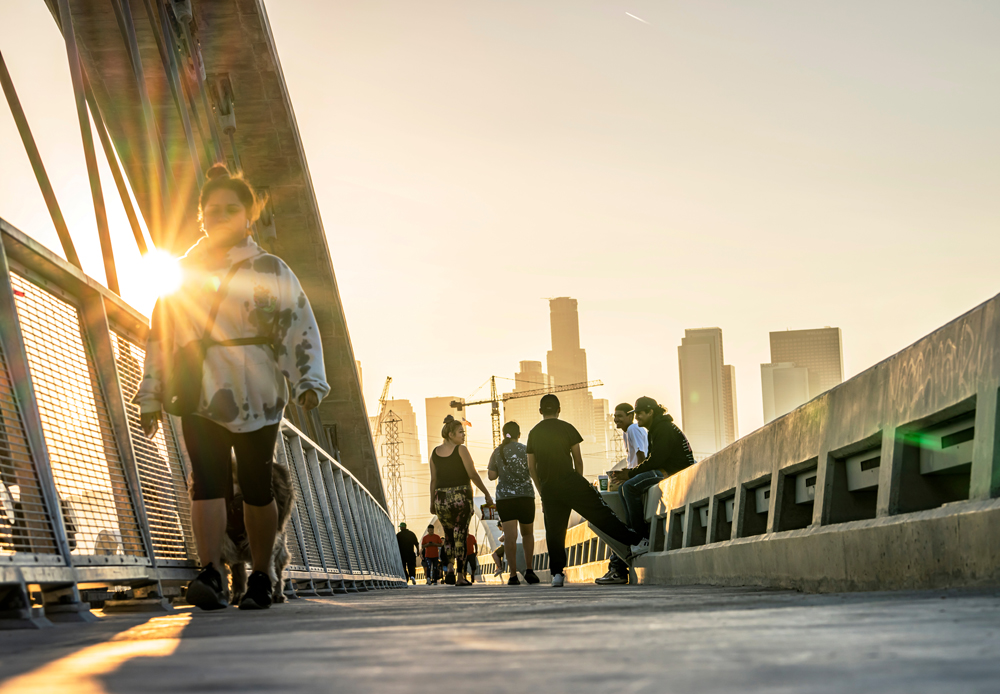 New span boasts an additional 40 feet width over the original bridge, totaling 100 feet wide, with dedicated lanes for pedestrians, bicycles and vehicles