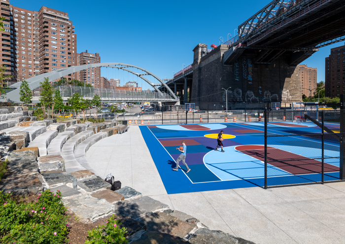 A rebuilt amphitheater for and several mixed-use athletic courts allow for accessible, multi-use community programming. A rebuilt amphitheater for and several mixed-use athletic courts allow for accessible, multi-use community programming.